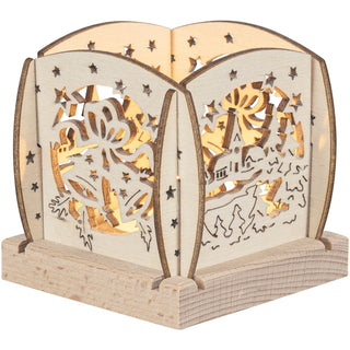 Kleiner Holz‑Kerzenhalter mit filigran ausgeschnittener Darstellung der Christi Geburt, umgeben von Sternen und Gebäuden; gestaltet für ein einzelnes Teelicht. beleuchtete Variante