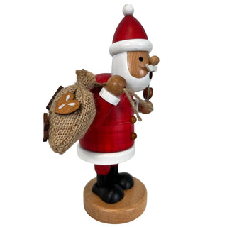 Farbiges Räuchermännchen „Weihnachtsmann“ aus Holz, 21 cm hoch, mit rotem Mantel, Jutesack und Pfeife. Seitenansicht rechts