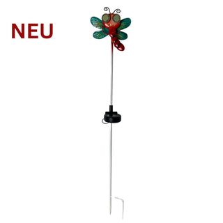 Gartenstecker „Libelle“ mit grünen Flügeln und rotem Körper, Solar‑LED und Augen mit wechselnder Blickrichtung, 77 cm hoch, auf weißem Hintergrund mit rotem Schriftzug „NEU“.