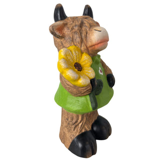 Dekofigur Galloway-Mädchen aus Terrakotta, 14 cm hoch, mit grünem Kleid und gelber Blume. Seitenansicht links