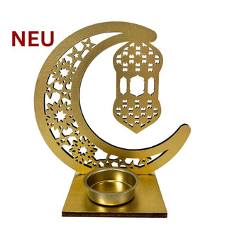 Goldfarbener Holz‑Kerzenhalter mit filigranem Halbmond‑ und Laternenmotiv, passend für ein Teelicht, 16 cm hoch.