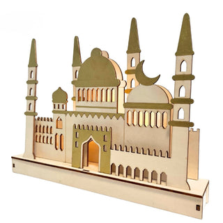 LED‑Diorama in Weiß und Gold aus Holz mit orientalisch inspiriertem Architektur‑Motiv und filigranen Türmen, 29 cm breit. beleuchtet, seitlich