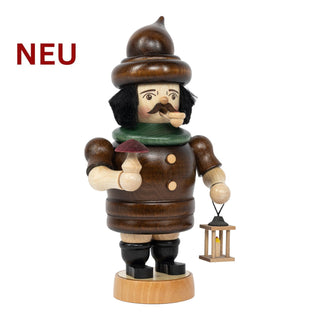 Farbiges Räuchermännchen „Wichtel“ aus Holz, mit spitzer Mütze, dunklem Mantel, kleinem Pilz in der Hand und Laterne; 20 cm hoch.