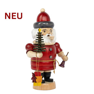 Farbig gestaltetes Räuchermännchen „Weihnachtsmann“ aus Holz, mit rotem Mantel, Mütze, geschnitztem Weihnachtsbaum und Geschenkpaketen; 20 cm hoch.