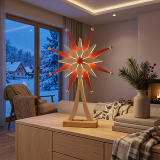 LED-Adventsstern in Rot und Naturholz (63 cm) mit integrierter Beleuchtung. Der mehrzackige Stern mit roten und naturfarbenen Elementen sowie dekorativen Holzkugeln an den Spitzen ist auf einem Holzfuß montiert. Das warme Licht setzt das klassische Sternmotiv stimmungsvoll in Szene und sorgt für eine festliche Atmosphäre in der Weihnachtszeit.