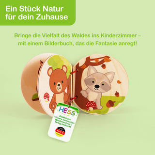 „Ein Holz-Bilderbuch für Kinder mit Illustrationen heimischer Waldtiere. Im Bild steht der Text: ‚Ein Stück Natur für dein Zuhause – Bringe die Vielfalt des Waldes ins Kinderzimmer – mit einem Bilderbuch, das die Fantasie anregt!‘. Ein Etikett am Buch trägt die Aufschrift: ‚HESS Bilderbuch „unsere heimischen Waldtierchen“, farbig bedruckt, 100 % MADE IN GERMANY‘.“