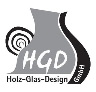 Logo der HGD Holz-Glas-Design GmbH mit stilisierter Vase in Grau und Schwarz, spiralförmigem Designelement sowie dem Schriftzug „HGD Holz-Glas-Design GmbH“.