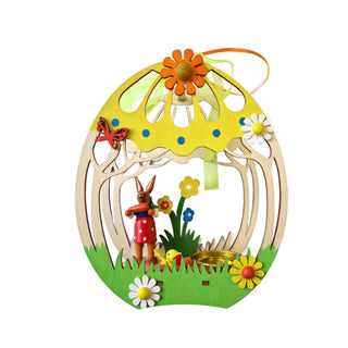 Teelichthalter in Eiform mit einer Osterhäsin und bunten Details