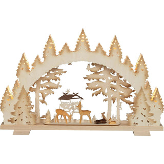 Schwibbogen aus Holz farblich abgesetzt, mit geschnitzten Rehen als Waldszene.