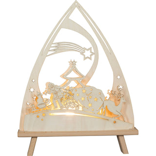 Holz-LED-Standleuchte mit weihnachtlichem Motiv: Dargestellt sind der Weihnachtsmann mit einem Geschenkesack und ein Rentier an seiner Seite. Über ihnen leuchtet ein Sternschnuppenmotiv, daneben ein stilisierter Weihnachtsbaum. Die Szene ist in eine bogenförmige Struktur mit ausgestanzten Sternen und dekorativen Elementen eingebettet und wird von hinten beleuchtet.