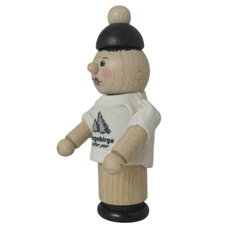 Ein hölzerner Räuchermann mit schwarzem Hut und weißem Hemd, auf dem "Erzgebirge natur pur" steht.  Seitenansicht rechts