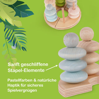 Ein Set aus Holz-Stapelspielzeug mit sanft geschliffenen, runden Formen in Pastellfarben. Die Spielzeuge sind auf einem runden Holzsockel gestapelt. Der Hintergrund ist grün mit Blattillustrationen. Im Bild sind zwei Ansichten zu sehen: eine Nahaufnahme und eine Gesamtansicht mit mehreren Stapeln. Text im Bild: „Sanft geschliffene Stapel-Elemente“ und „Pastellfarben & natürliche Haptik für sicheres Spielvergnügen“.