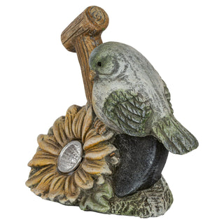 Vogel aus Keramik mit Spaten und Blüte. In der Mitte der Blüte befindet sich ein LED-Solarlicht_2