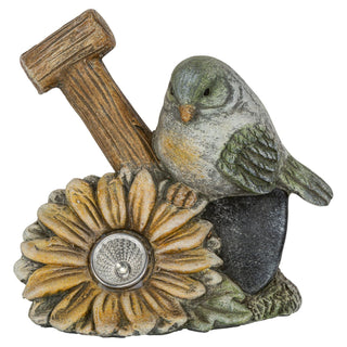 Vogel aus Keramik mit Spaten und Blüte. In der Mitte der Blüte befindet sich ein LED-Solarlicht_1