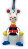 Schwingfigur "Mara" Käfer-Motiv, Rot-Schwarz mit gelben und blauen Akzenten