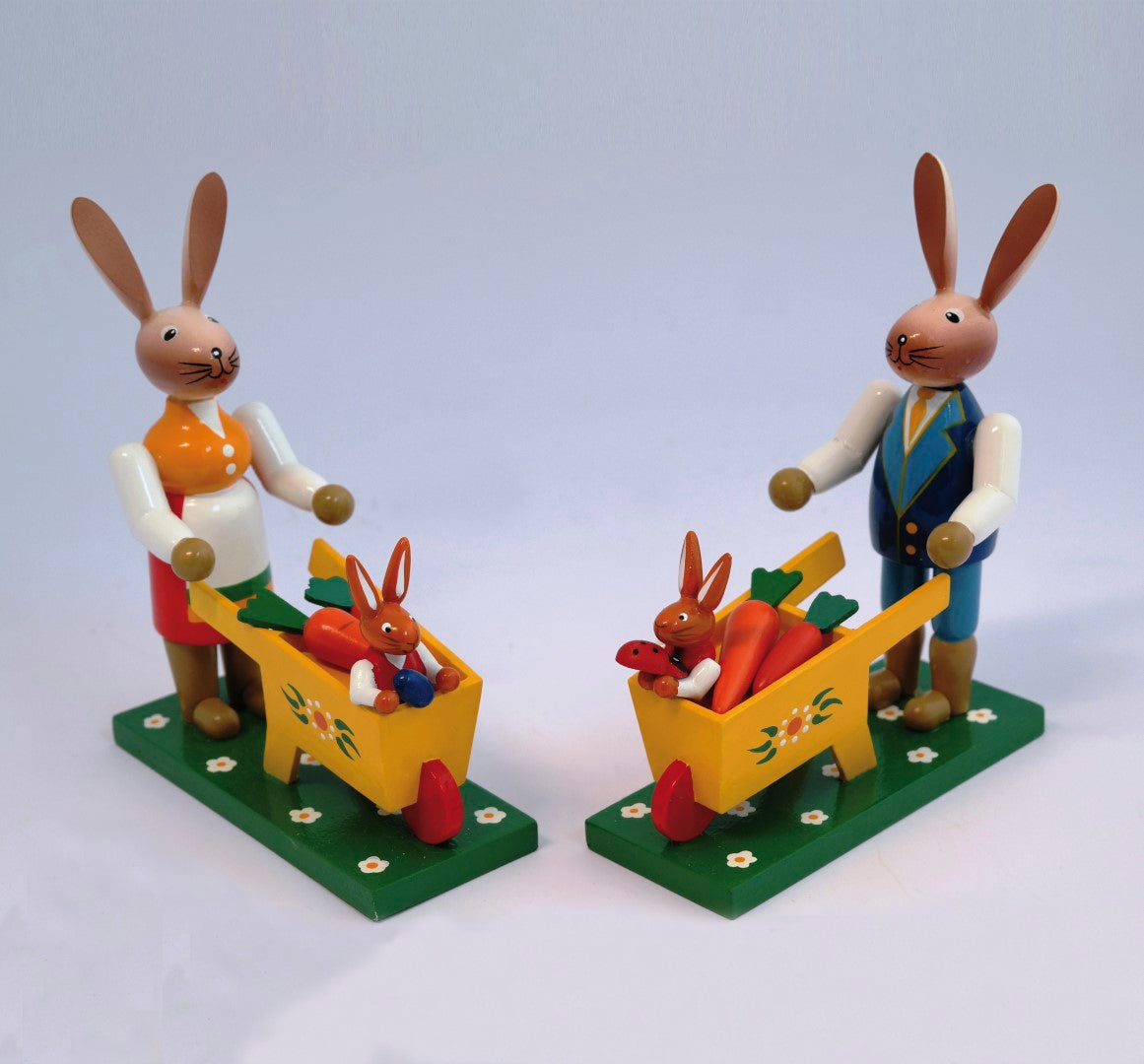 Pair of rabbits with wheelbarrow