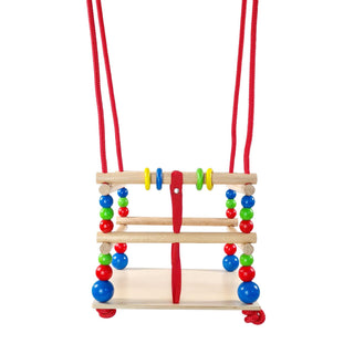 Gitterschaukel aus Holz, naturfarben mit bunten Kugeln und rotem Strick