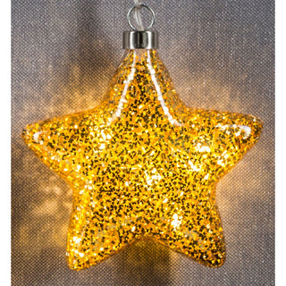 Der beleuchtete LED Glasstern kommt in einer Gold-Dekor Optik daher. Er hat eine Größe von ca. 15cm im Durchmesser. Er verfügt zudem über eine modernes Batteriefach, welches zugleich auch als Aufhänger dient. Die LED Beleuchtung lässt ihn in den Abendstunden erstrahlen und die Timer Funktion sorgt für eine bequeme Handhabung._2