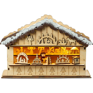 Naturfarbene, LED Weihnachtsmarkthütte mit Batteriefach und Timer. In der Bude zeigt ein Verkäufer seine Waren. Holzkunst, wie Schwibbögen, Laternen, Engel &amp; Bergmann und Reiterlein, bietet er an. 