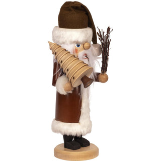 Von der Seite zu sehen ist hier, der Nussknacker Weihnachtsmann in braun. Seite 9.