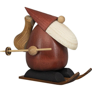 Im Seitenprofil sieht man hier den  Weihnachtsmann mit Rucksack und Skiausrüstung. Diese Figur ist in verschiedenen Motiven erhältlich. Bild 7.