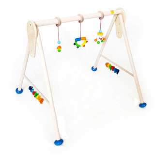 Spielbogen aus Holz, naturbelassen mit bunten Greifspielzeugen