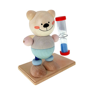 Zahnputzuhr aus Holz mit Bärchen-Motiv in blau und einer Halterung für die Zahnbürste