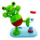 Zahnputzuhr aus Holz mit Frosch-Motiv in grün und rot und einer Halterung für die Zahnbürste_1