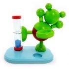 Zahnputzuhr aus Holz mit Frosch-Motiv in grün und rot und einer Halterung für die Zahnbürste_2